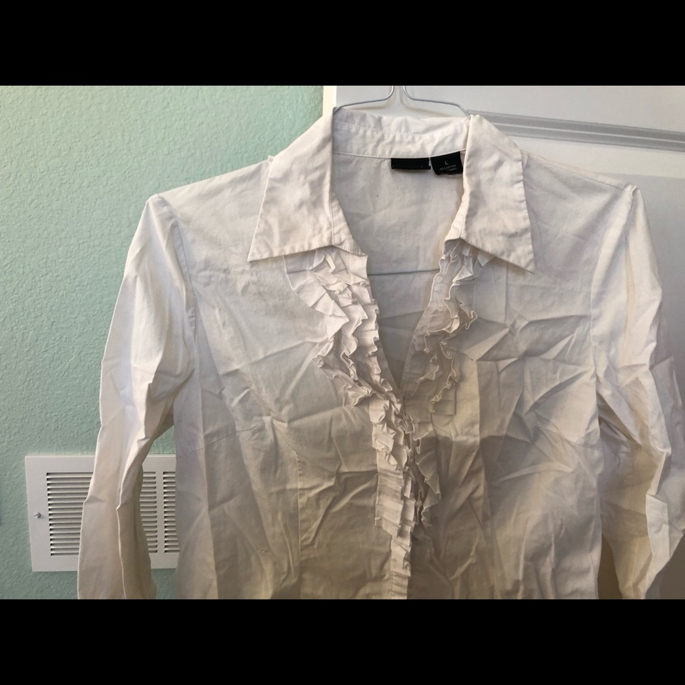 Woman’s white button down blouse